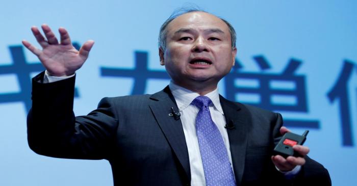 FILE PHOTO: Japan's SoftBank Group Corp Chief Executive Masayoshi Son attends a news conference