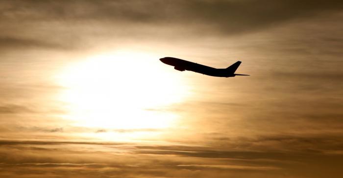 FILE PHOTO: A plane is seen during sunrise at the international airport in Munich