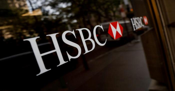 HSBC logos are seen on a branch bank in the financial district in New York