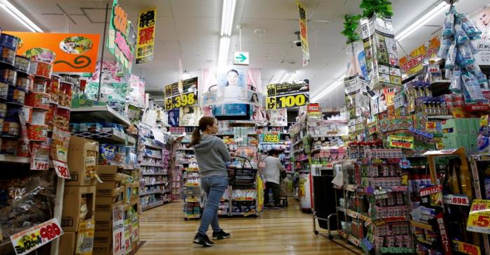 FILE PHOTO: Shoppers browse products at Japanese discount retailer Don Quijote Holdings' store