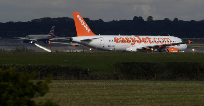 An EasyJet passenger aircraft  prepares for take off from Gatwick Airport in southern England,