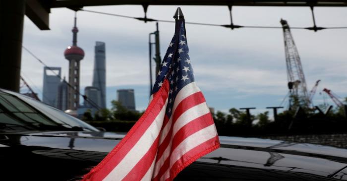 U.S. flag on an embassy car is seen outside a hotel in Shanghai