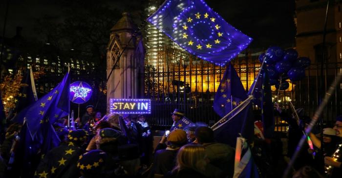 Anti-Brexit protesters demonstrate outside the Houses of Parliament