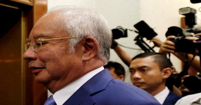 FILE PHOTO: Former Malaysian Prime Minister Najib Razak arrives at Kuala Lumpur High Court in