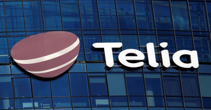 FILE PHOTO: Telia sign is seen on a building in Vilnius