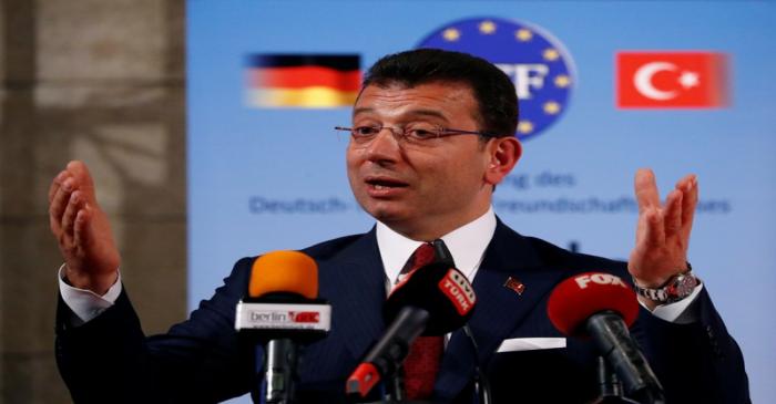 Istanbul Mayor Ekrem Imamoglu is awarded by Berlin's Mayor Michael Mueller with the