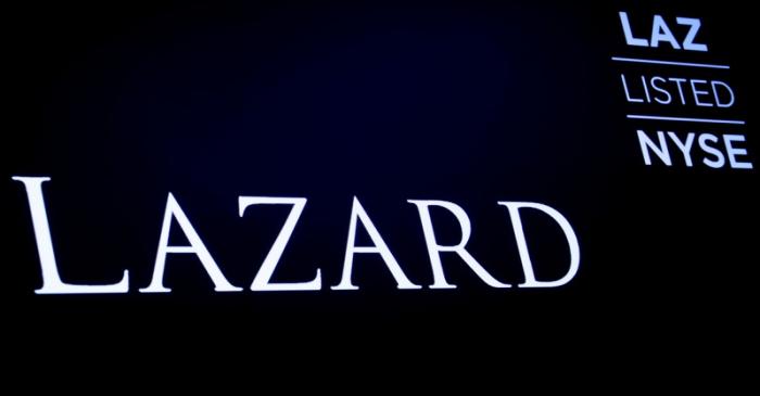 FILE PHOTO: The logo and trading information for Lazard Ltd appear on a screen on the floor at