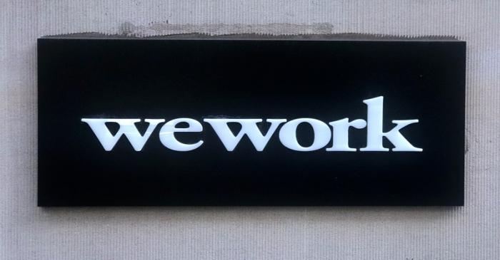 FILE PHOTO: A WeWork logo is pictured in the Manhattan borough of New York City