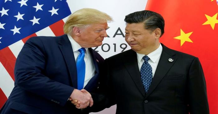 FILE PHOTO: Trump meets Xi at the G20 leaders summit in Osaka, Japan