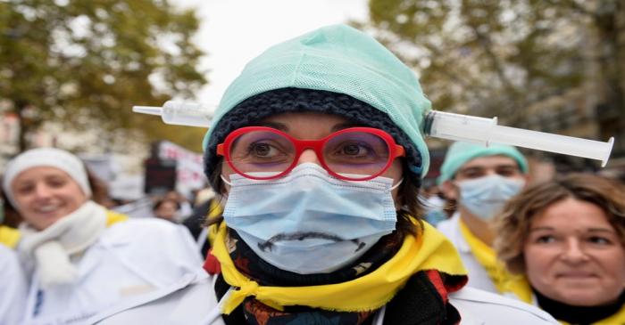 French hospitals and health workers on strike attend a demonstration in Paris