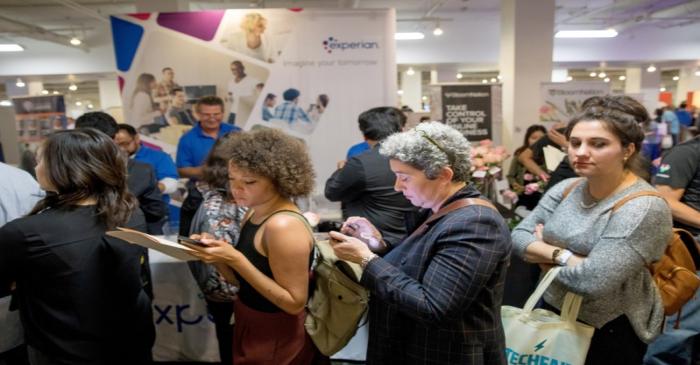 FILE PHOTO: Job seekers and recruiters gather at TechFair in Los Angeles
