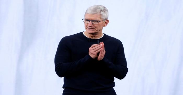 FILE PHOTO: CEO Tim Cook speaks at an Apple event at their headquarters in Cupertino