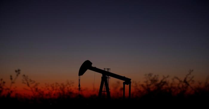 FILE PHOTO:  An oil pump is seen just after sunset outside Saint-Fiacre