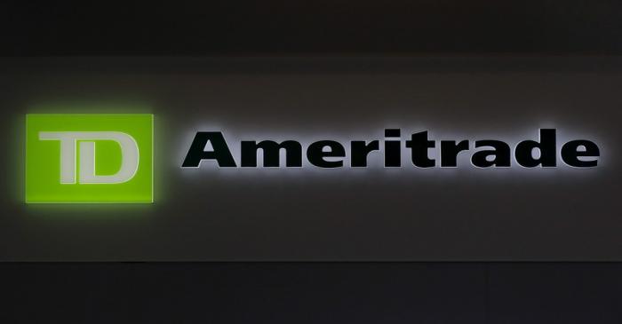 FILE PHOTO: A TD Ameritrade sign glows at the entrance to a branch in the financial district in