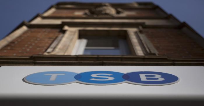 A sign is displayed outside a branch of the TSB bank in central London