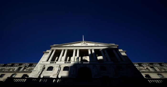 An adjacent building throws a shadow accross the Bank of England in the City of London