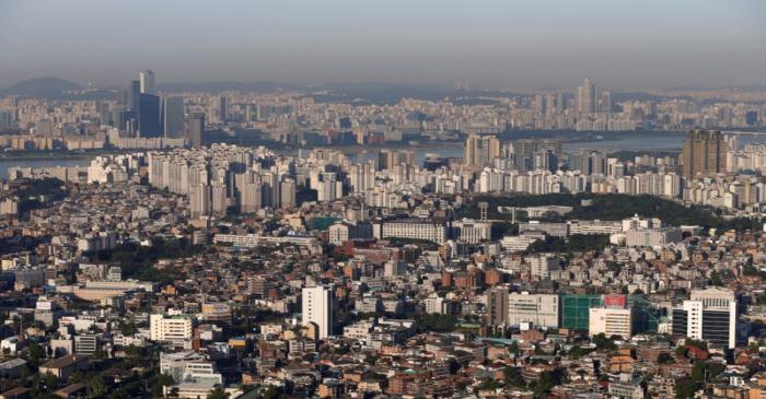 FILE PHOTO: The skyline of central Seoul is seen during sunrise in Seoul