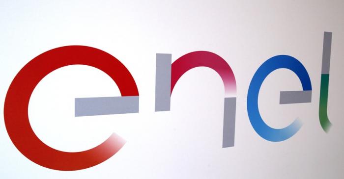 The new logo of Italy's biggest utility Enel is seen inside its flagship store in downtown