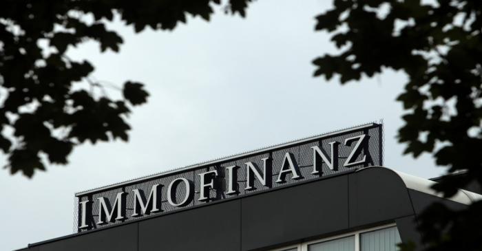 The logo of Austrian real estate group Immofinanz is pictured on top of the company's