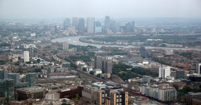 The Canary Wharf financial district is seen from the construction site of 22 Bishopsgate in