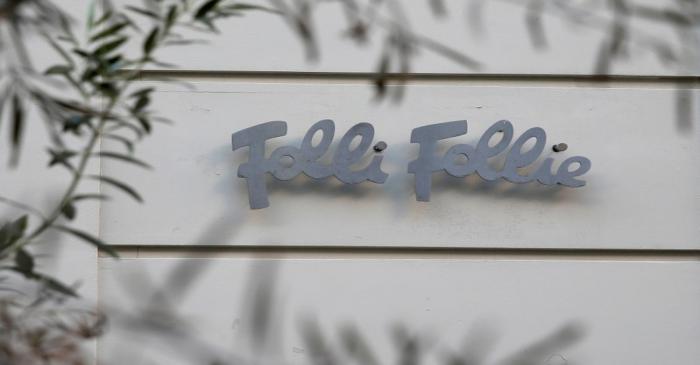 A Folli Follie logo is seen outside a store in central Athens
