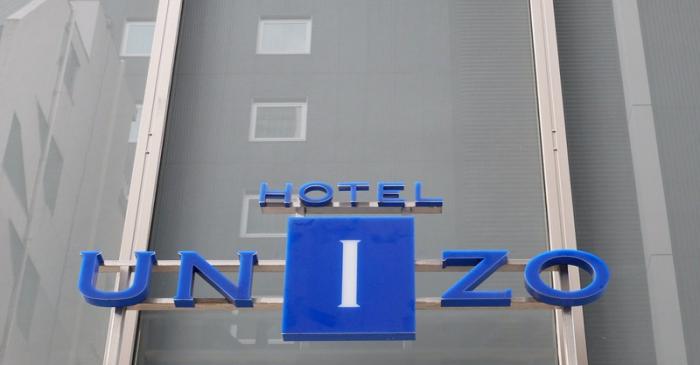 FILE PHOTO: The logo of Hotel Unizo, operated by Japanese hotel operator Unizo Holdings, is