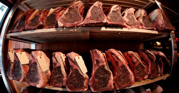 FILE PHOTO: Cuts of USDA prime dry-aged beef are seen in the dry-aging room in the lobby of