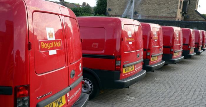 FILE PHOTO: Royal Mail vans are parked in the Leytonstone post office depot in London, Britain