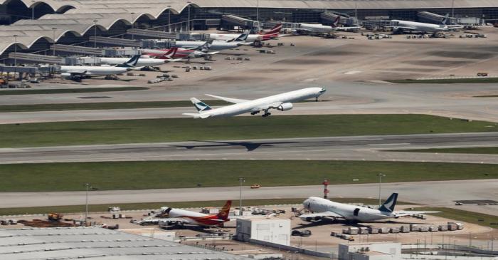 A Cathay Pacific flight takes off from the Hong Kong International Airport,