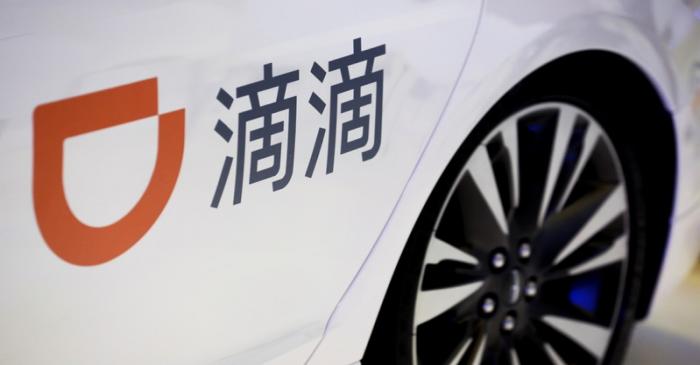 FILE PHOTO: The logo of ride-hailing company Didi on a car door