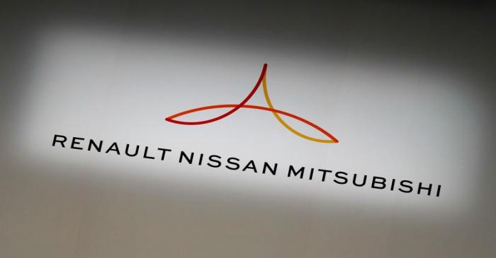 Renault, Nissan and Mitsubishi chiefs hold a news conference in Yokohama