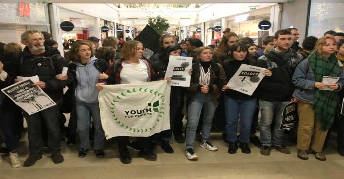 French activists protest the annual Black Friday shopping frenzy in Paris