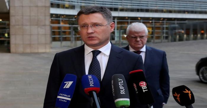 FILE PHOTO: Russian Energy Minister Alexander Novak speaks with the media outside the EU