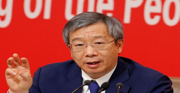 Governor of People's Bank of China (PBOC) Yi Gang attends a news conference on China's economic