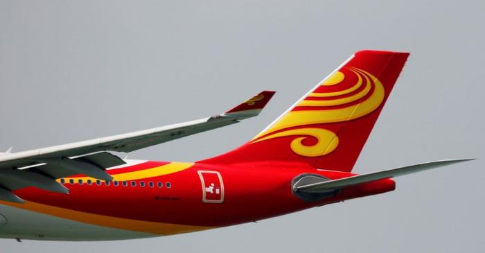 A Hong Kong Airlines Airbus A330-300 descends before landing at Hong Kong Airport in Hong Kong