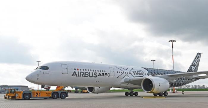 FILE PHOTO: An Airbus A350 XWB flight-test aircraft is towed during a media-day at the German