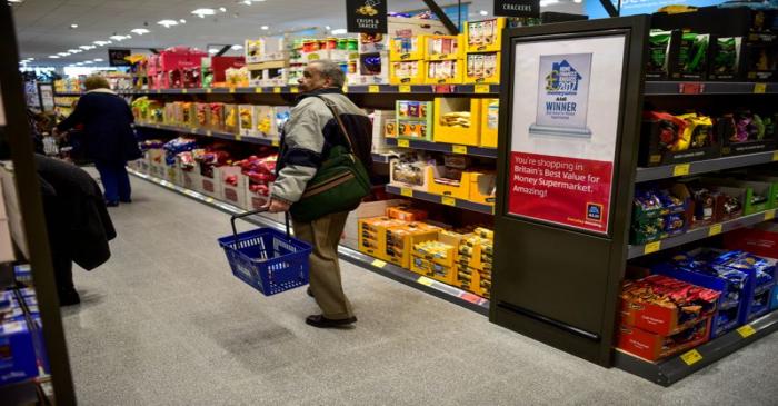Shoppers browse in an Aldi store in London
