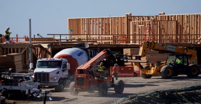 Work crews construct a new hotel complex on oceanfront property in Encinitas, California