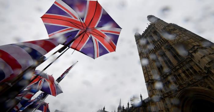 FILE PHOTO: Union Jack flags are seen outside the Houses of Parliament in London