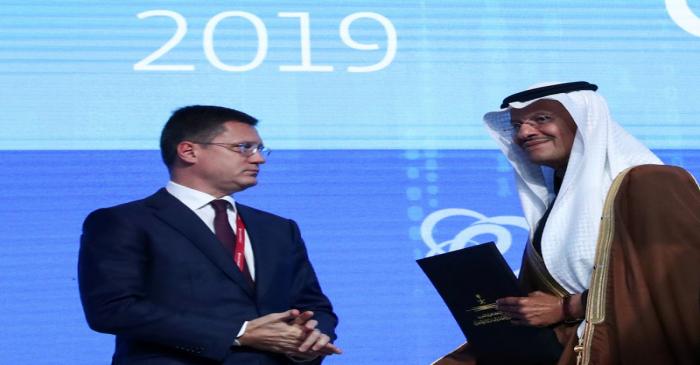 FILE PHOTO: Saudi Energy Minister Bin Salman and Russian Energy Minister Novak attend the