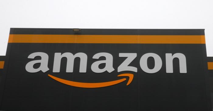 The Amazon logo is seen at the Amazon fulfilment center in Bretigny-sur-Orge near Paris