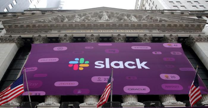 FILE PHOTO: The Slack Technologies Inc. logo is seen on a banner outside the New York Stock