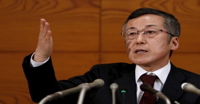 Newly-appointed Bank of Japan board member Harada points at a reporter during news conference
