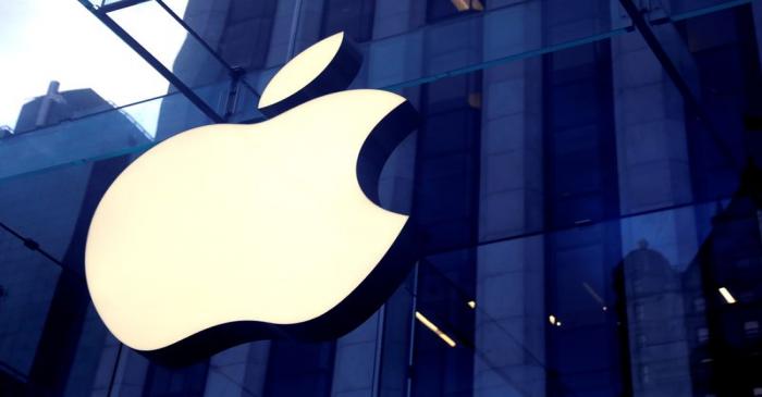 FILE PHOTO: The Apple Inc. logo is seen hanging at the entrance to the Apple store on 5th