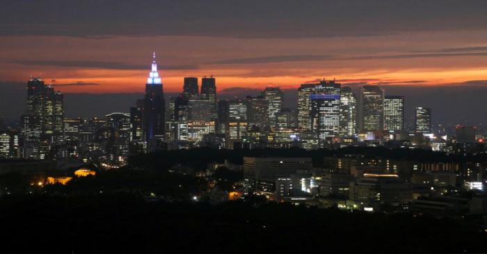 FILE PHOTO :High-rise buildings are seen at the Shinjuku business district during sunset in