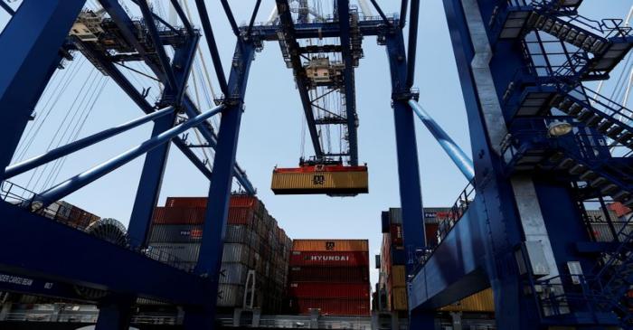 FILE PHOTO: A shipping container is unloaded from a neopanamax vessel at Wando Welch Terminal