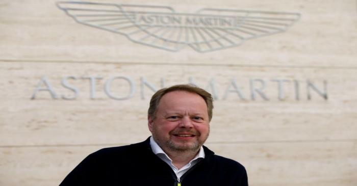 FILE PHOTO: Andy Palmer, CEO of Aston Martin poses for a photograph at their world headquarters