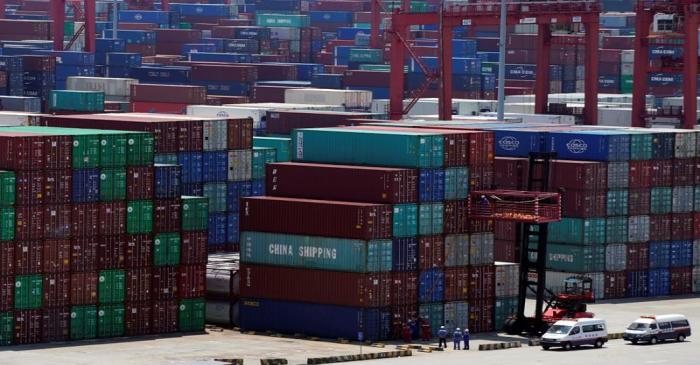 Containers are seen at the Yangshan Deep Water Port in Shanghai