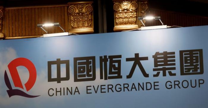 A logo of China Evergrande Group is displayed at a news conference on the property developer's