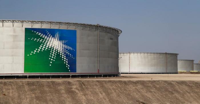 FILE PHOTO: A view shows branded oil tanks at Saudi Aramco oil facility in Abqaiq